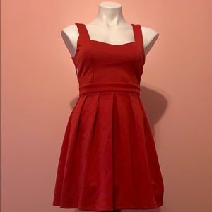 Open back (heart shaped) dress. Never worn.